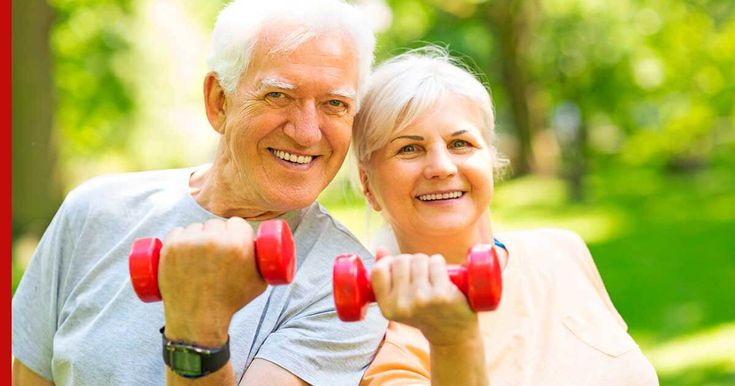Older adults exercising with small dumbbells