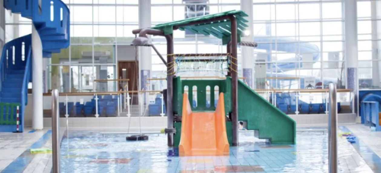 The colourful waterslide and pool play area at LeisureWorld Churchfield
