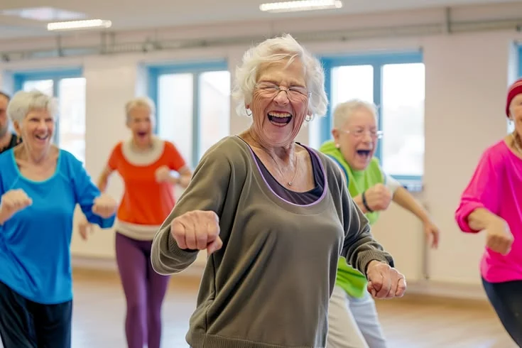 Older adults taking part in a group movement session